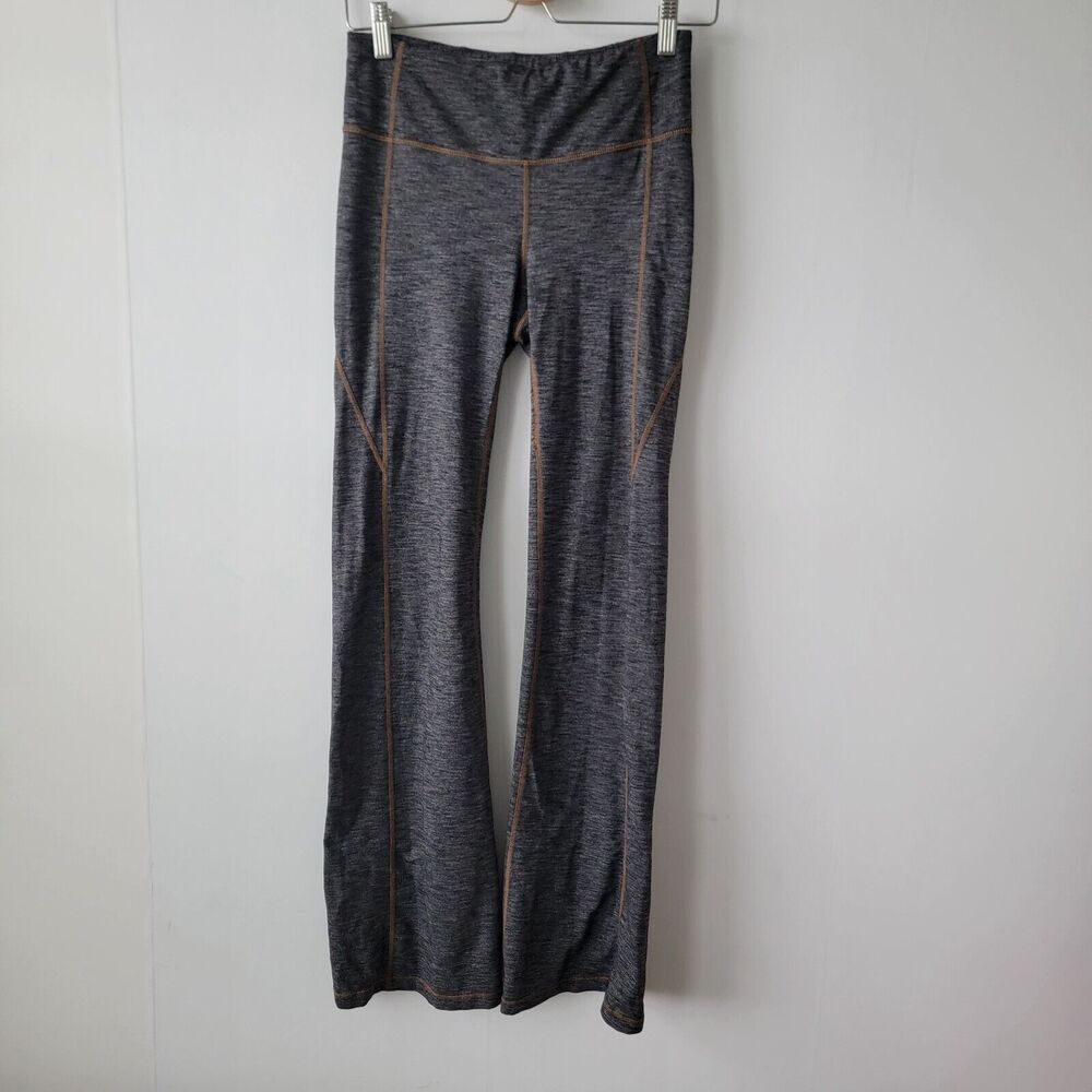 Athleta‎ power kick reflective strip yoga pants size  M